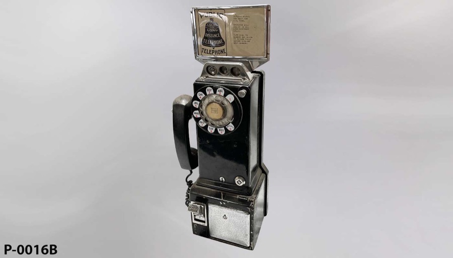 Vintage rotary pay phone, stock number P-0016B, photographed on a clean studio background
