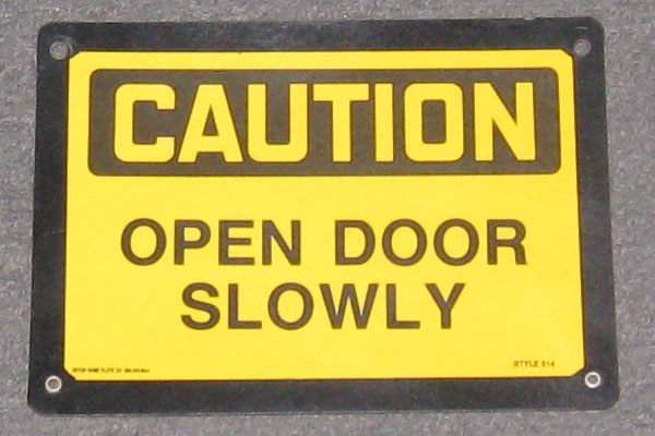 Sign-Caution open door slowly, stock number S-0287
