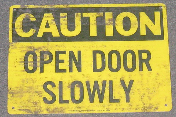 Sign-Caution Open Door Slowly, stock number S-0783