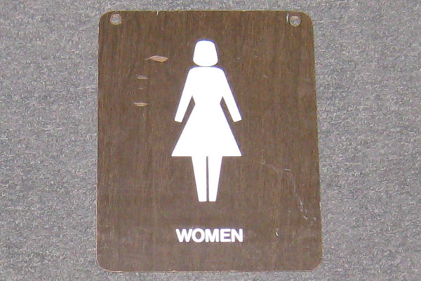 Sign-Women w/ symbol of female figure, stock number S-0786