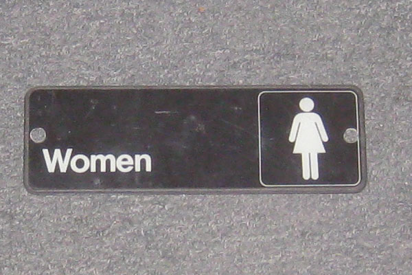 Sign-Women w/ symbol of a female figure, stock number S-0815