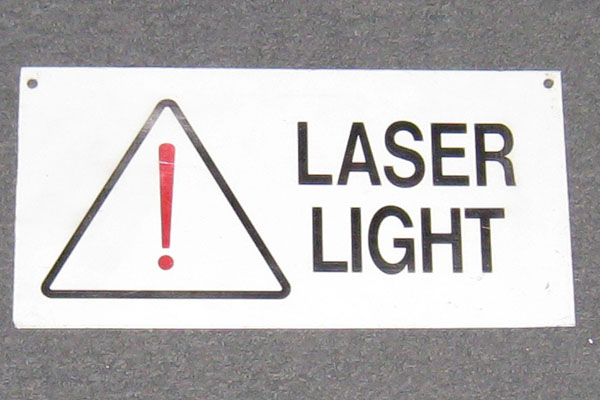 Sign-Laser Light w/ ! Inside a triangle, stock number S-0870