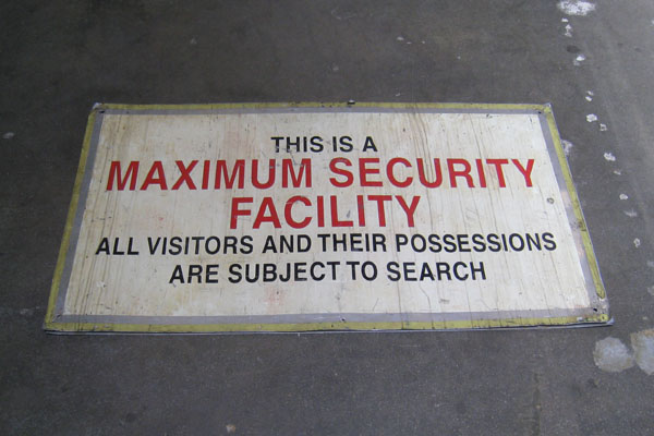 Sign-This Is a Maximum Security Facility. All Visitors & Their Possessions Are, stock number S-0875