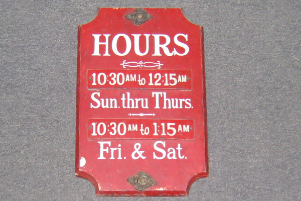 Sign-odd shape-Hours 10:30AM to 12:15AM Sun Thru Thurs 10:30AM to 1:15AM Fri &, stock number S-0897