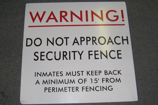 Sign-Warning Do Not Approach Security Fence! Inmates Must Keep Back A Minimum, stock number S-1288