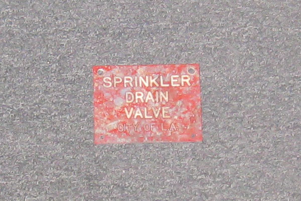 Sign-Sprinkler Drain Valve, stock number S-1310