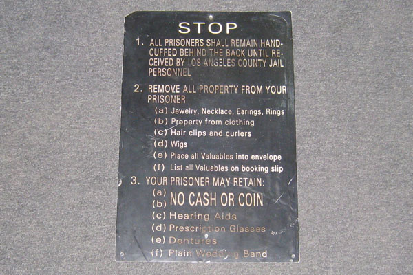 Sign-Stop All Prisoners Should Remain Handcuffed Behind the Back Until Received, stock number S-1595