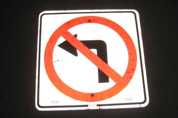 Sign-International symbol for no left turn, stock number S-2322