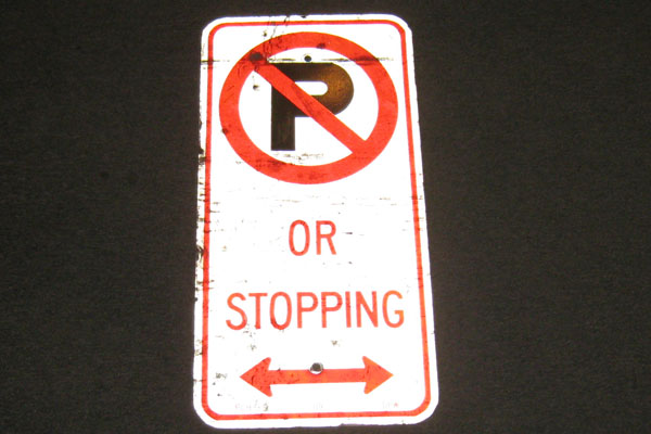 Sign-International symbol for no parking "Or Stopping" <-->, stock number S-2330