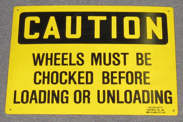 Sign-Caution Wheels Must Be Chocked, stock number S-2447