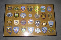 Police patch display board, stock number P-0042