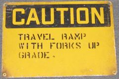 Sign-Caution Travel Ramp with Forks Up grade metal, stock number S-0085