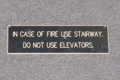 Sign-In Case of Fire Use Stairway Do Not Use Elevator, stock number S-0388