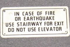 Sign-In Case of Fire or Earthquake Use Stairway For Exit Do Not Use, stock number S-0395