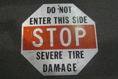 Sign-Do Not Enter This Side Stop Severe Tire Damage, stock number S-0500
