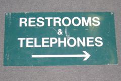 Sign-Restrooms & Telephones <----, stock number S-0579