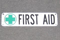 Sign-First Aid with green cross in circle, stock number S-0718