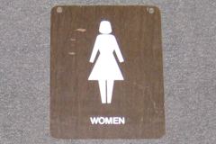 Sign-Women w/ symbol of female figure, stock number S-0786