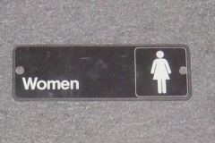 Sign-Women w/ symbol of a female figure, stock number S-0815