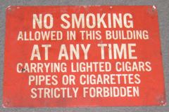 Sign-No Smoking Allowed In This Building At Any Time Carrying Lighted, stock number S-0848