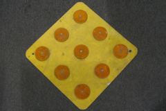 Sign-9 orange reflectors, stock number S-0900