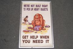 Sign-We're Not Built Right To Pick Up Heavy Objects..., stock number S-0939B