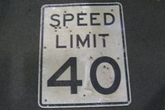 Sign-Speed Limit 40 - has bullet holes - metal, stock number S-1031