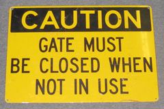 Sign-Caution Gate Must Be Closed When Not In Use, stock number S-1382