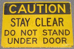 Sign-Caution Stay Clear Do Not Stand Under Door, stock number S-1538