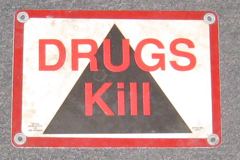 Sign-Drugs Kill, stock number S-1599