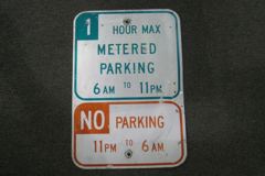 Sign-1 Hour max metered parking 6am to 11pm/ No parking 11pm to 6am, stock number S-1644