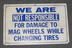 Sign-We Are Not Responsible For Damage To Mag Wheels While Changing, stock number S-1700