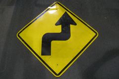 Sign-curved arrow, stock number S-1934