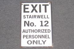 Sign-Exit Stairwell #12 Authorized Personnel Only, stock number S-1998