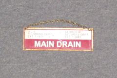 Sign-Main Drain, stock number S-2242