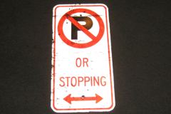 Sign-International symbol for no parking "Or Stopping" <-->, stock number S-2330