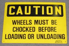 Sign-Caution Wheels Must Be Chocked, stock number S-2447
