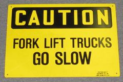 Sign-Caution Fork Lift Trucks Go Slow, stock number S-2448